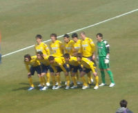 試合前の記念撮影中の選手達